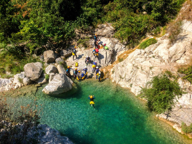 Canyoning in Rio Barbaira - Rocchetta Nervina Departure of a canyoning group at Rocchetta Nervina, Liguaria - Italy canyoneering stock pictures, royalty-free photos & images