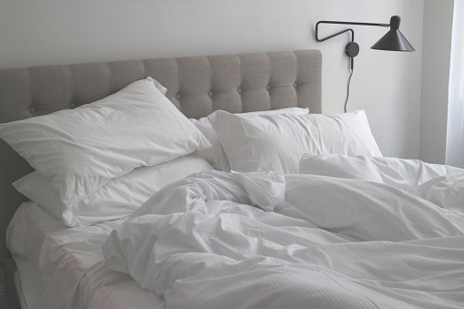 A shot of ruffled bed sheets