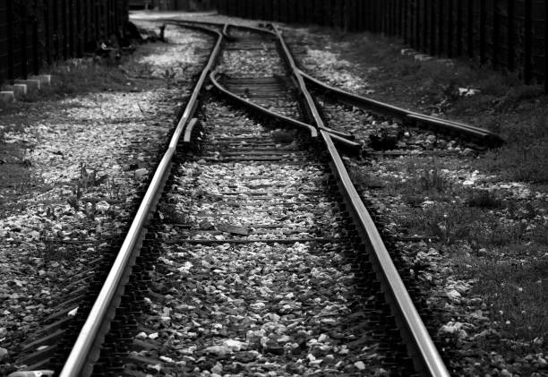 istock Old railroad track in black and white 941563156