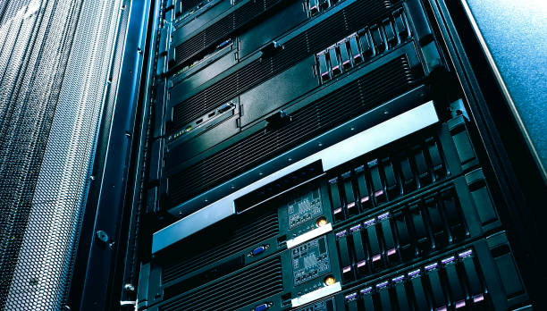 Server technology in datacenter from bottom view with depth of field stock photo