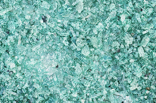 Close-up of broken glass texture. Top view