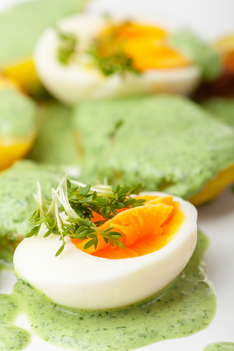 green sauce with eggs and potato
