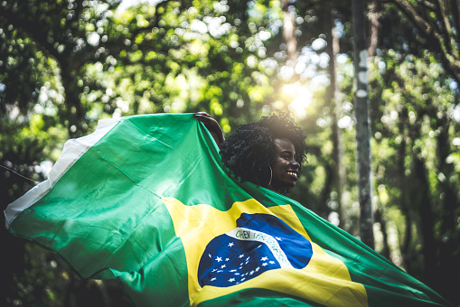 Brazilian Girl Celebrating with Brazil Flag