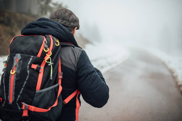 istock Senior man trail hiking on high mountain 941586000