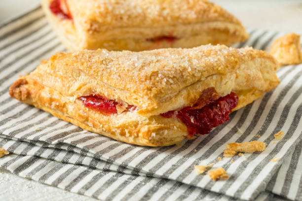 Homemade Cherry Turnover Pastries Homemade Cherry Turnover Pastries Ready to Eat strudel stock pictures, royalty-free photos & images