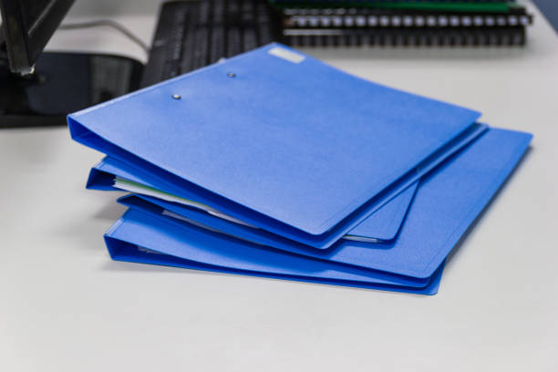 file folder and Stack of business report paper file  on desk in office, business concept. file folder and Stack of business report paper file  on desk in office, business concept. tabs ring binder office isolated stock pictures, royalty-free photos & images