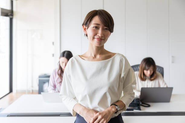 istock asian businesswomen working in office 941593452