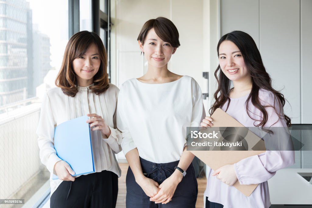 asian businesswomen working in office Japanese Ethnicity Stock Photo