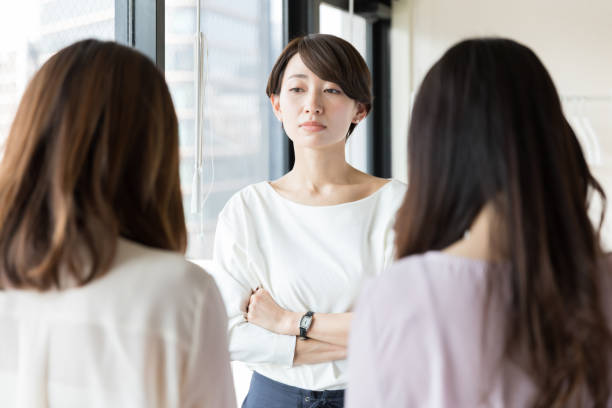 asian businesswomen working in office asian businesswomen working in office subordination stock pictures, royalty-free photos & images