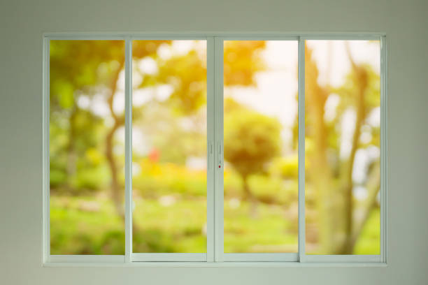 istock green garden view through the window 941594930