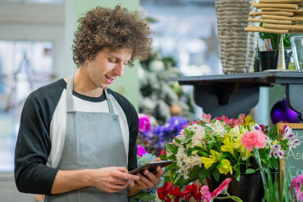 istock Working in a Flower Shop 941595066