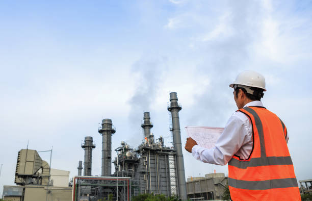 istock Engineer is checking plant around Gas turbine electrical power plant 941595476