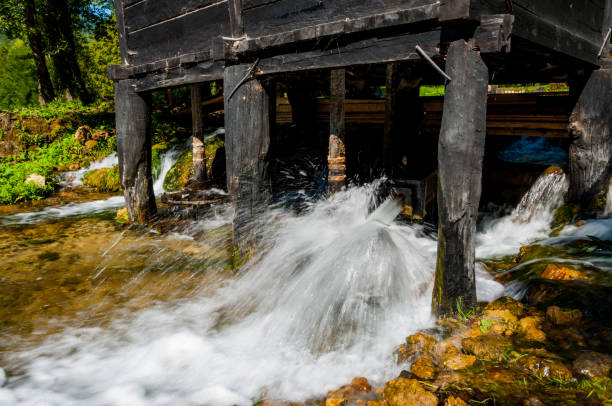 istock Small wooden watermill 941596552
