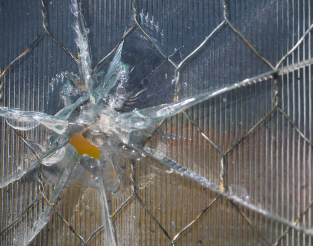 istock A Wire Reinforced Window with a Bullet Hole 941597008
