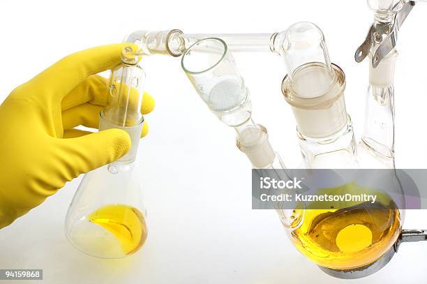 Chemistry Experiment Yellow Stock Photo - Download Image Now - Alcohol - Drink, Analyzing, Beaker