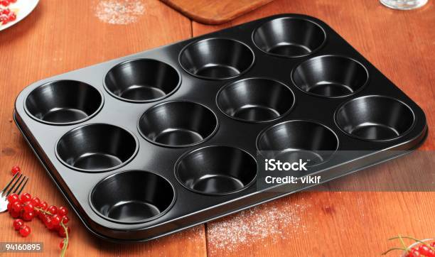 Twelve Cup Muffin Tin Stock Photo - Download Image Now - Baking Sheet, Black Color, Clean