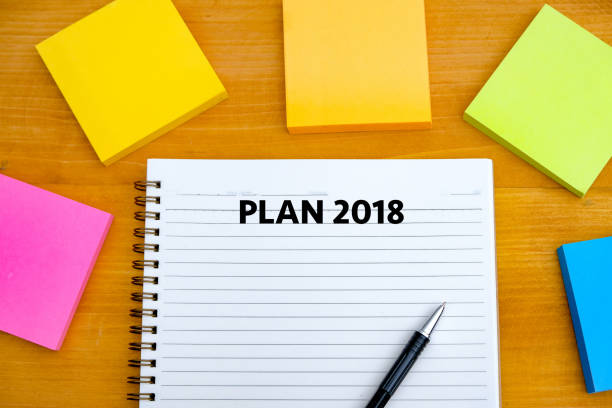 istock Plan 2018 Notebook business team meeting  with an Plan 2018 941611878