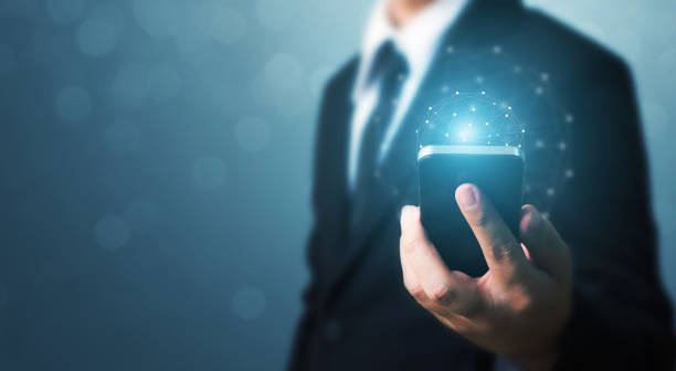 istock Social networking and world technology connection concept, Businessman hand holding mobile phone with global network connection 941612576