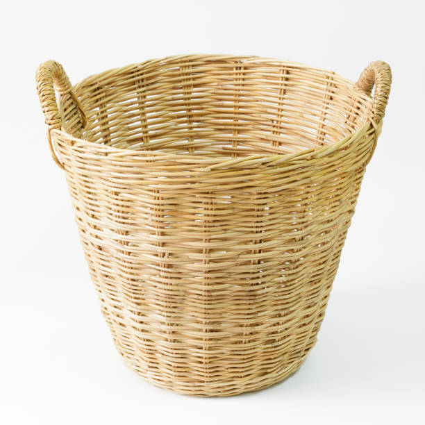 istock Empty wooden wicker basket isolated on white background. 941614932