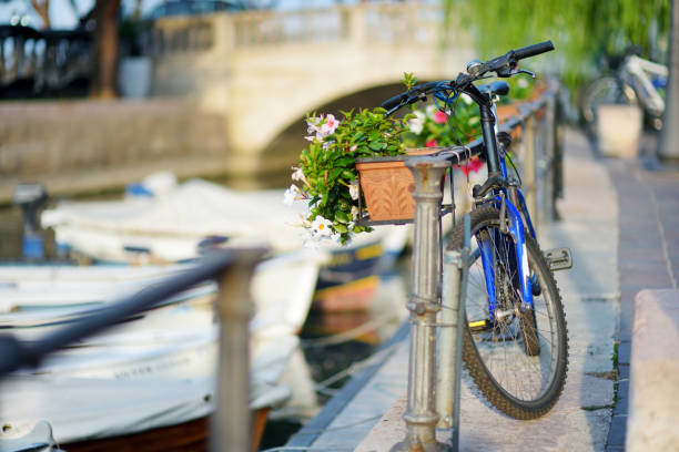 istock Some bikes parked in small European town 941615632