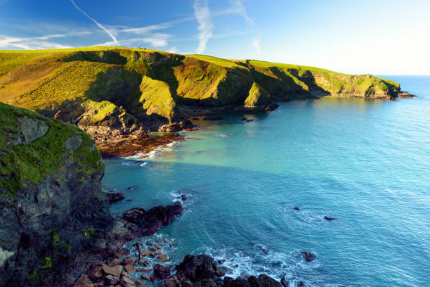 Scenic rugged Cornish coastline near Port Isaac historic fishing village on sunny morning, Cornwall, England