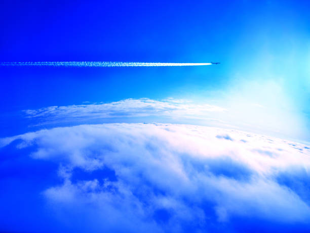 istock Airplane trail above the clouds 94162284