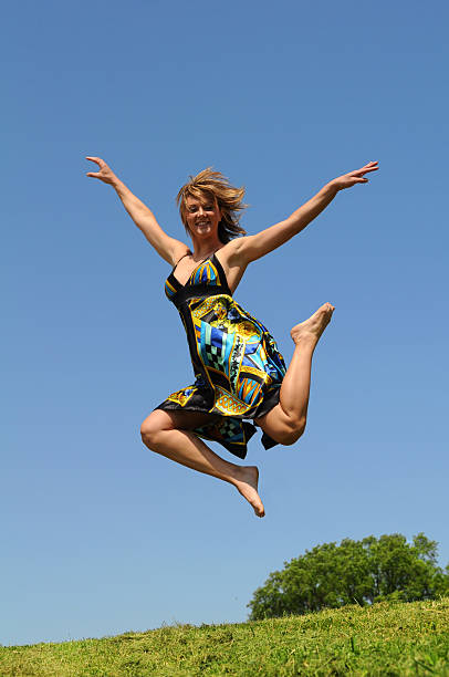 istock Woman Jumping Outdoors 94162301