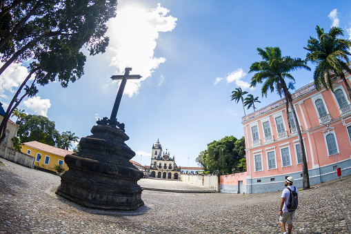 Male tourist enjoying his vacations and visit San Sao Francisco Church in Joao Pessoa, Paraiba, Brazil