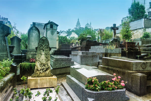 tombstones at montmartre cemetery in paris, france - cemetery montmartre paris france france imagens e fotografias de stock