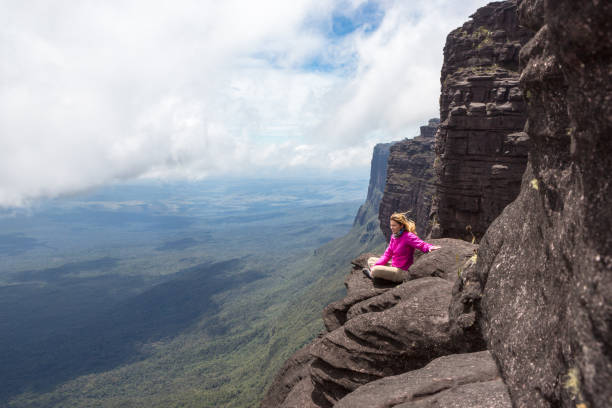 istock Woman during trekking in Mount Roraima 941636506