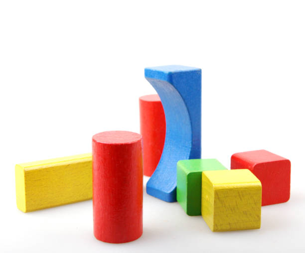 istock Wooden building blocks isolated on white background 941659346