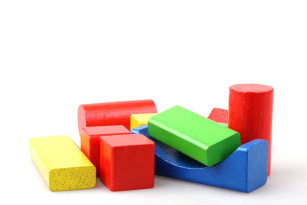 istock Wooden building blocks isolated on white background 941659356