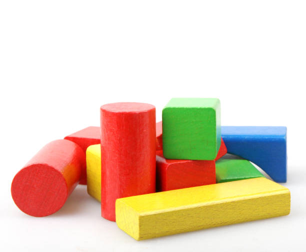istock Wooden building blocks isolated on white background 941659370