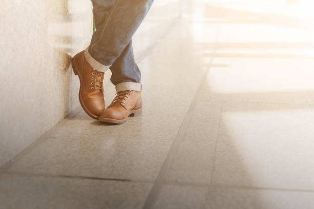 istock Man standing of blue jeans. 941664172