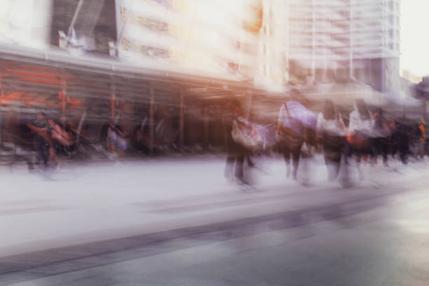 istock People in city with blurred images. 941664214