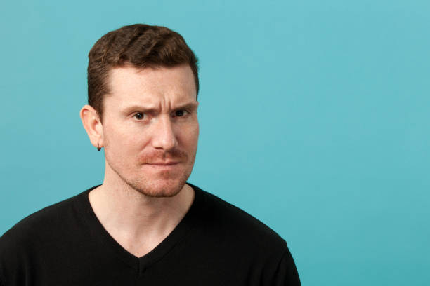istock close-up portrait of a young man in studio 941665310