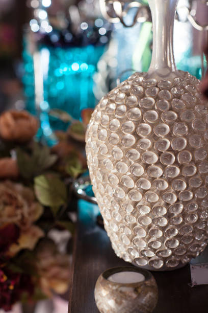 istock Glass cups and vases in the sun 941665986