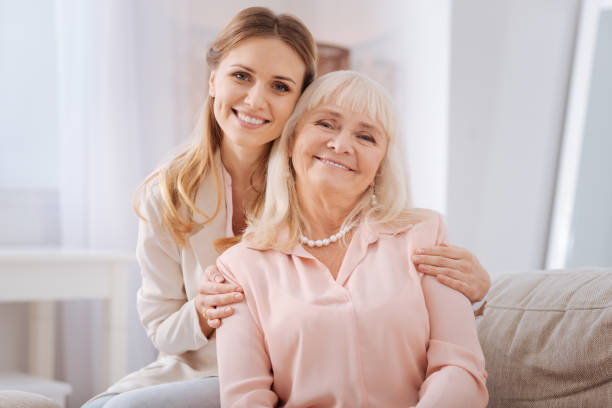 istock Nice young woman hugging her mother 941668840