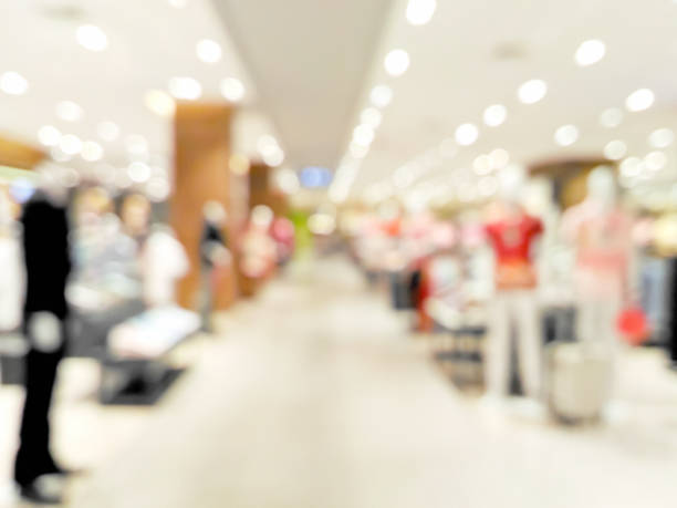 istock Blurred clothing shop with mannequin 941669050