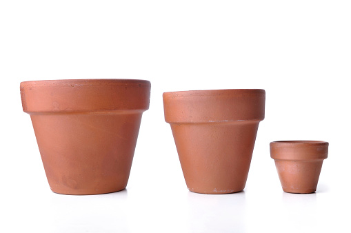 High angle view group of empty flower pots in the garden