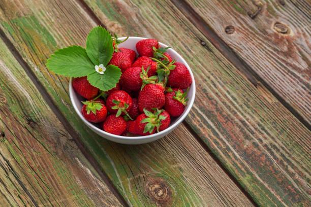 istock Fresh strawberry on wooden background,with copy space. 941674088
