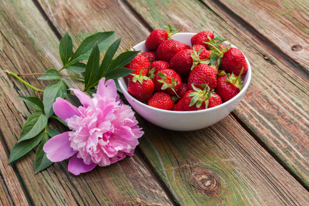 istock Fresh strawberry on wooden background,with copy space. 941674140