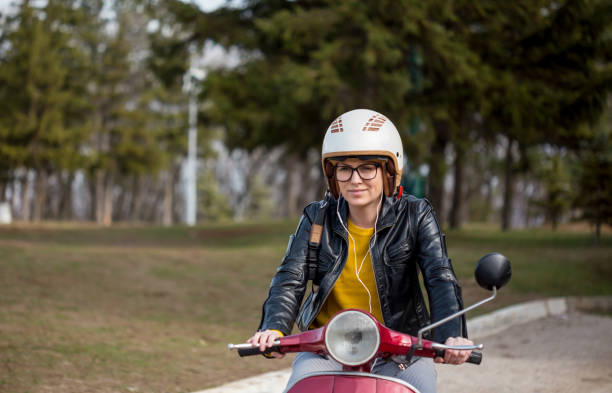 istock girl in the scooter 941681696