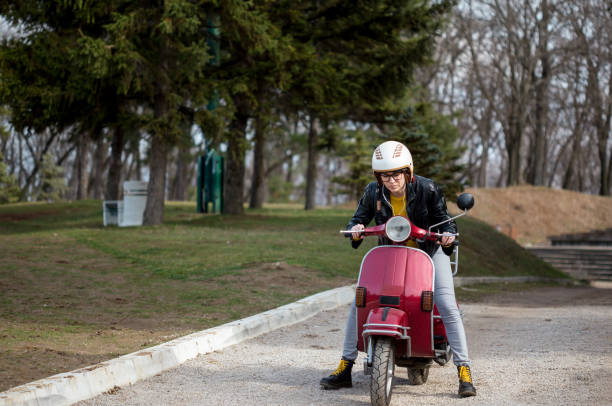 istock girl in the scooter 941681778