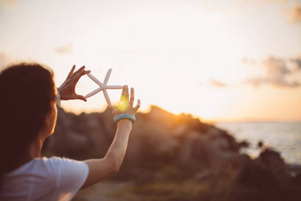 istock Young woman staring the sunset 941681958
