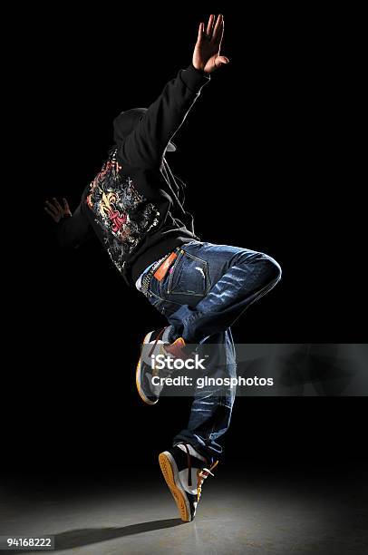 A Single Hip Hop Dancer Pictured On A Black Background Stock Photo -  Download Image Now - iStock
