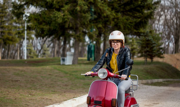 istock girl in the scooter 941682714