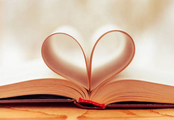 istock vintage style, heart shape from paper book, close up 941682778
