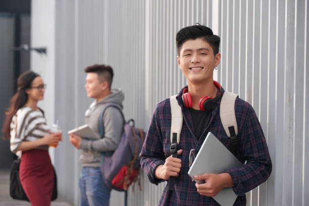 istock Portrait of Smiling Asian Student 941682884