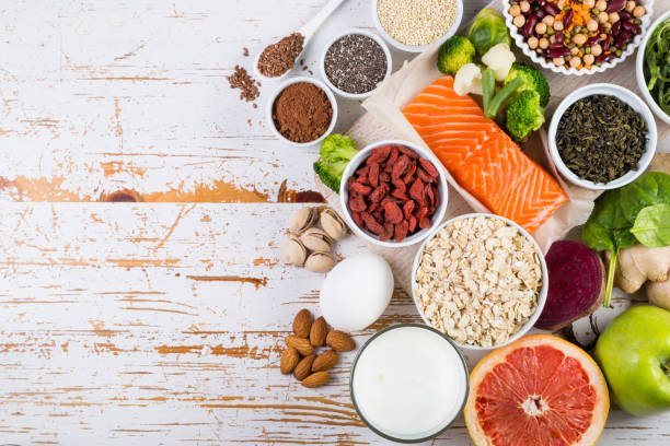 istock Selection of superfoods on rustic background 941683786